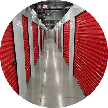 Storage hallway with red unit doors